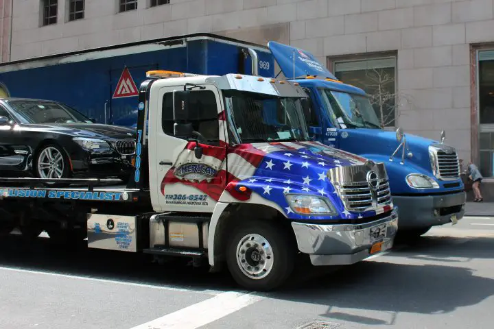 blue and white truck close-up photography