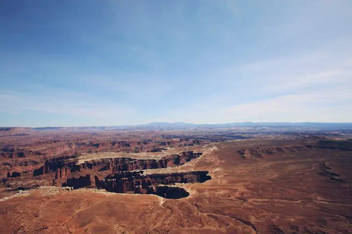 brown rock formation under blue sky during daytime