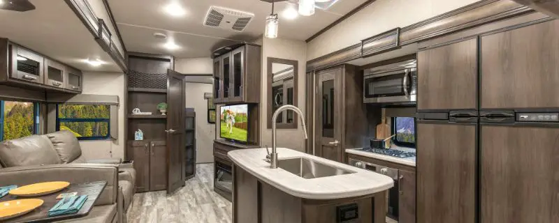 The Best Luxury Travel Trailers In 2022, Travel Trailer With Kitchen Island And Bunkhouse